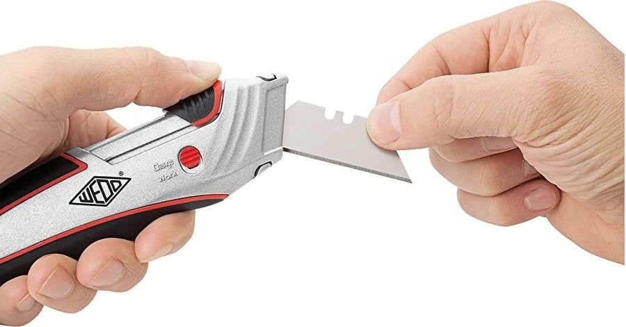 Thikë prerëse WEDO Cutter Safety Profi me 5 tehe rezervë, e zezë/kuqe
