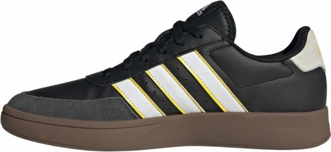Atlete adidas, të bardha dhe të zeza
