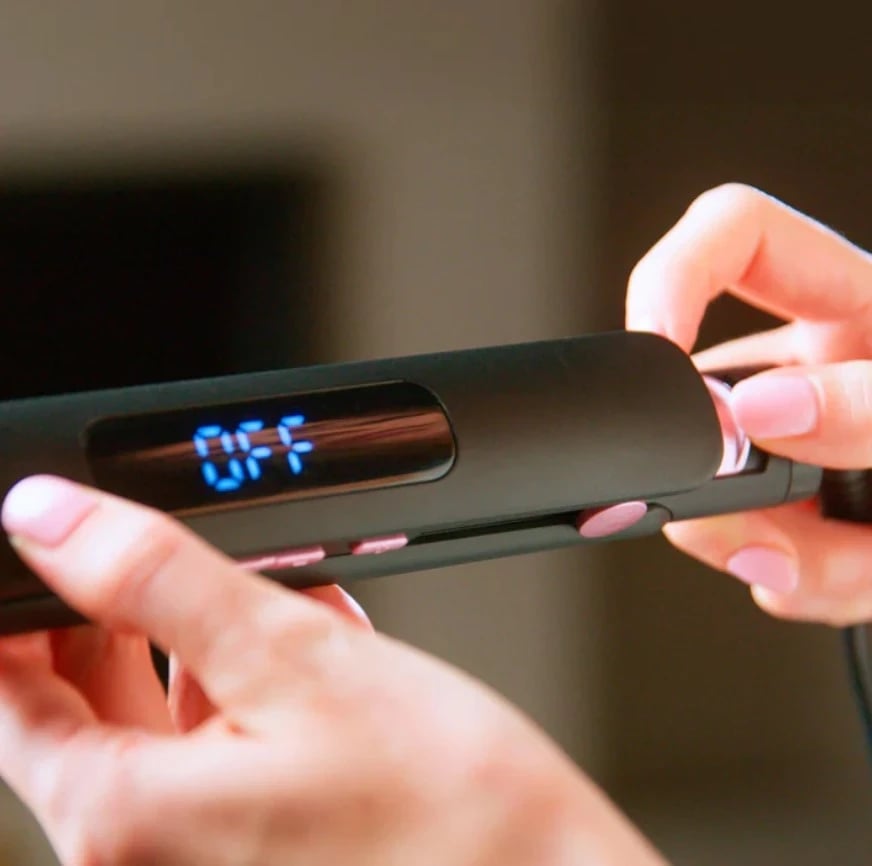 Hekur për drejtimin e flokëve Taurus Slimlook Ionic Pro, i zi