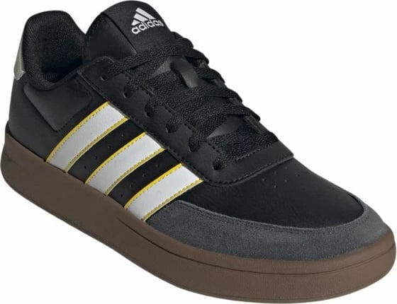 Atlete adidas, të bardha dhe të zeza