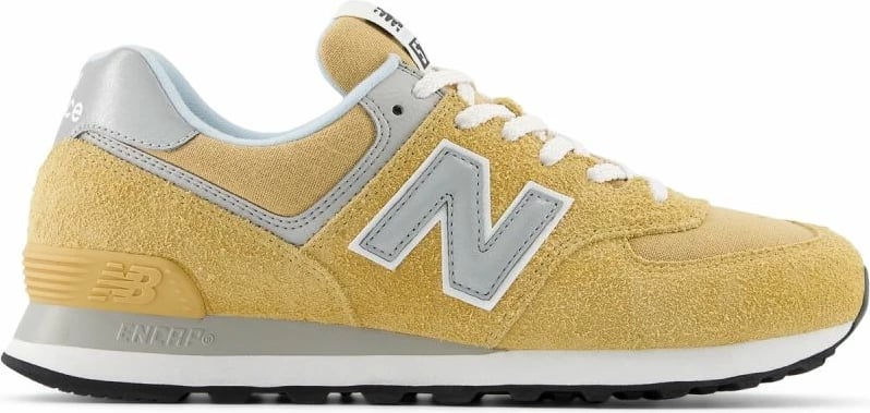 Atlete New Balance, për meshkuj dhe femra, të verdha