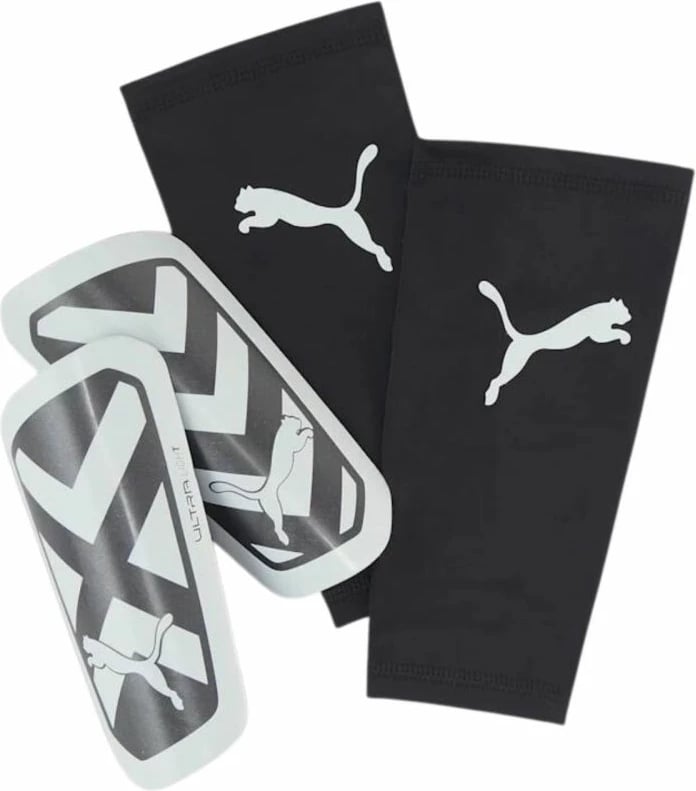 Mbrojtëse për shin të meshkujve Puma, të bardha e të zeza