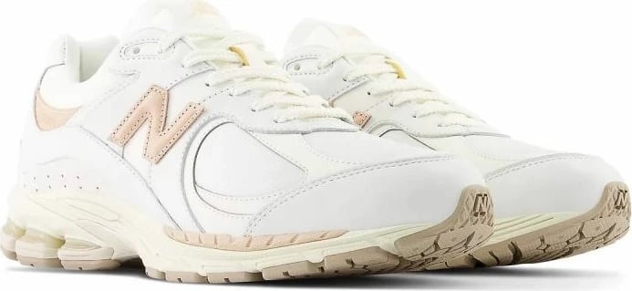 Atlete New Balance për femra dhe meshkuj, të bardha