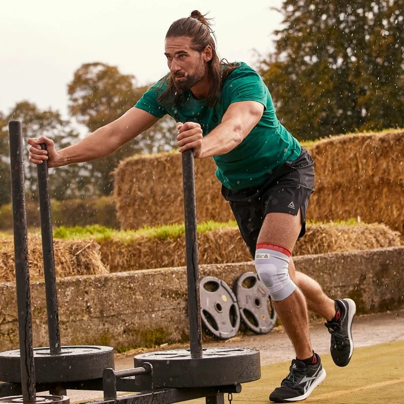 Mbështjellëse gju për stërvitje Reebok SpeedWick, ngjyrë blu
