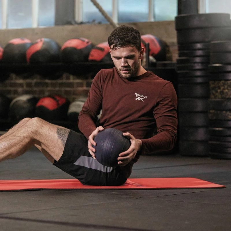 Tapet për stërvitje Reebok, 173 x 61 cm, e kuqe