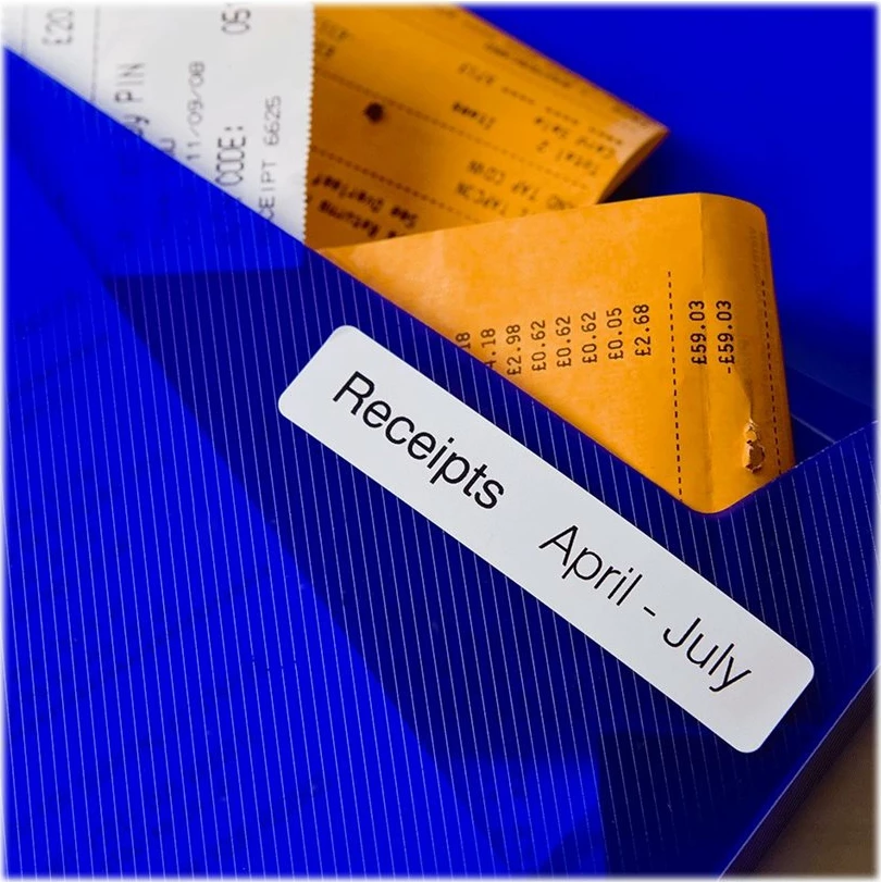 Etiketa Brother DK-11203 për dosje, 17x87mm, 300 copë, bardhë me të zezë