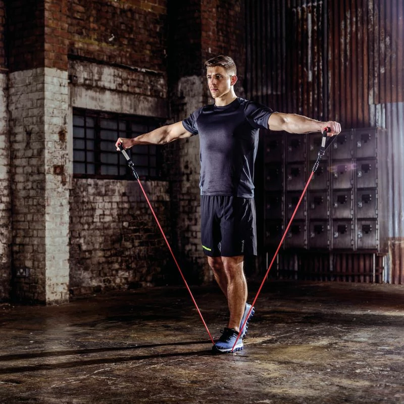 Atlete për stërvitje Reebok, të zeza dhe të kuqe